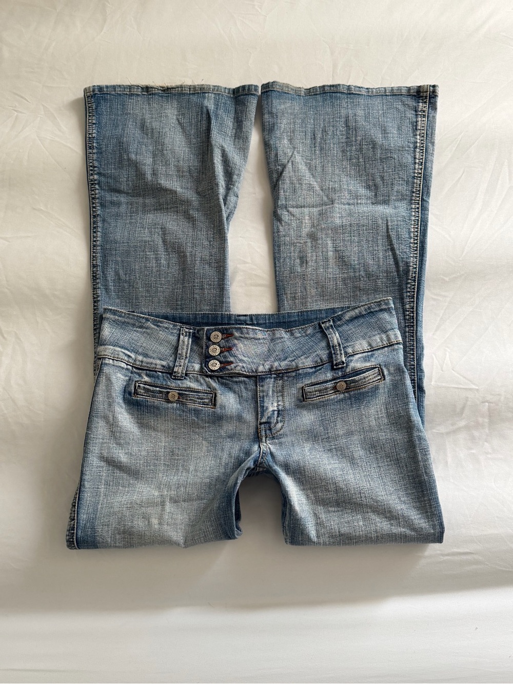 2000s hydraulic triple button jeans